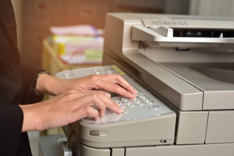 women-workers-are-using-a-copier-in-the-office.